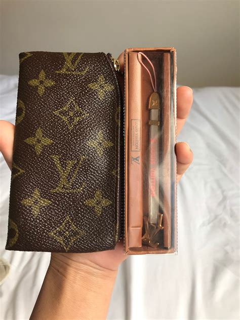 lv wristlet keychain|louis vuitton key ring wallet.